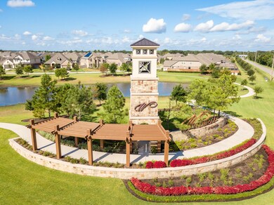 This Village Builder Home is located in a gated section of Wildwood at Oakcrest with easy access to the Grand Parkway and 249!