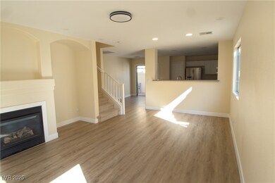 Unfurnished living room with wood finished floors,