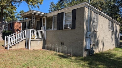 View of property exterior with cooling unit and a 