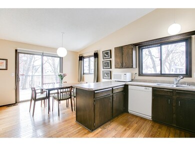 High ceilings and hardwood flooring flow into the 