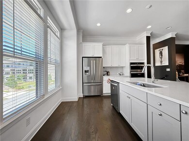 Kitchen with stainless steel appliances, wide  sin