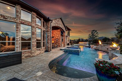 Fantastic Spanish-style estate is located on a cul-de-sac/greenbelt lot