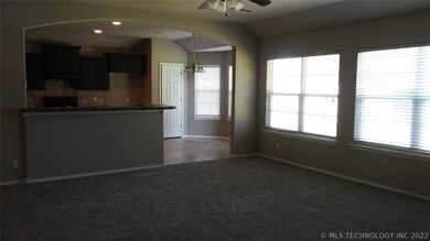 Open floor plan, wall of windows in living. Great