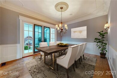 Large inviting dining room has been virtually stag