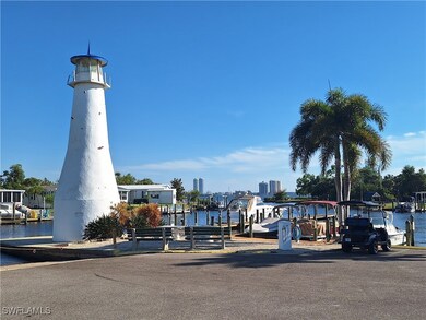 View of property's community featuring a boat dock