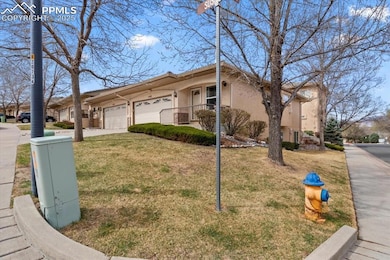 View of front of property with concrete driveway, 