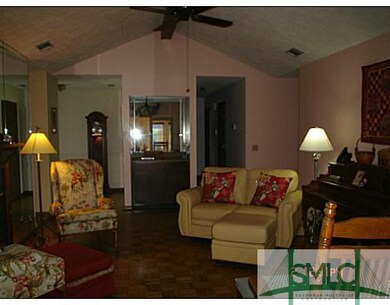 Living Room. Original, well-kept Parkay flooring