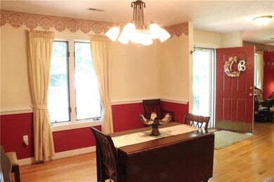 Formal Dining Room with Hardwood Floors