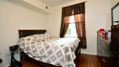 This large bedroom can easily accommodate all of y