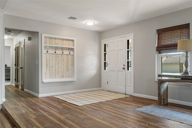 Open floorplan with new laminate flooring