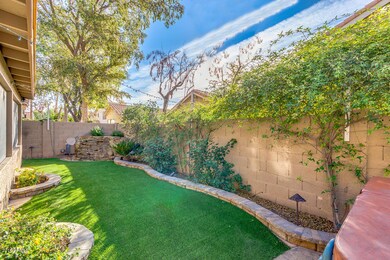 Backyard with synthetic lawn