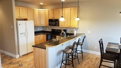 Open front room with kitchen, dining area and fami