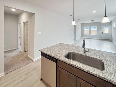 The Cardinal II- Kitchen into Family Room. Home un