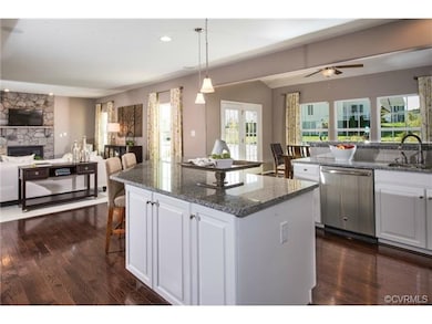 KITCHEN OPEN TO FAMILY ROOM