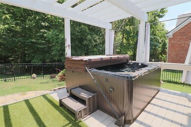 Hot tub remains.  2 yrs old.  $8000 tub brand new.