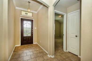 Entryway featuring light tile patterned floors