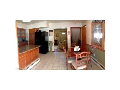 Eating area in and breakfast bar in kitchen.