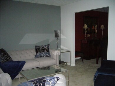 Formal living room, with the formal dining room a 