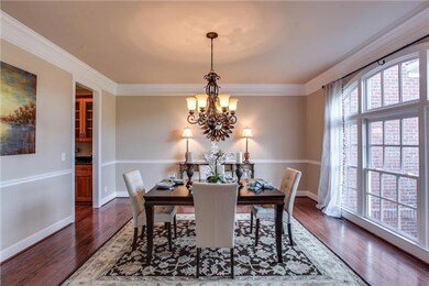 Formal dining room with loads of windows and natural light, butler's pantry between dining room and kitchen, for easy serving.......