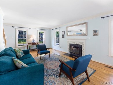 HW floors, fireplace, french doors to deck.