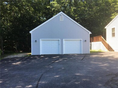 oversized garage with storage above
