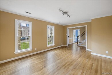 Living Room w/ Hardwood Floors, Overhead Lighting,
