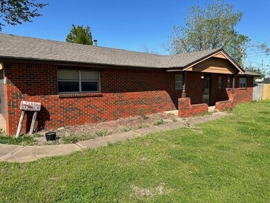 View of front of property with a front lawn