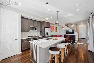 Stunning kitchen featuring open floor plan, stainl