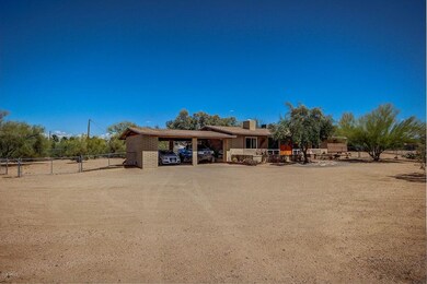 Two car carport with storage.