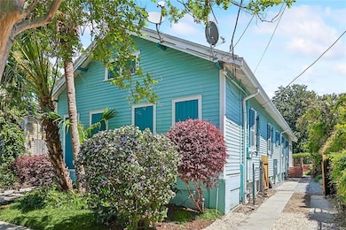 3 CARS COULD FIT ON THE RIGHT SIDE OF THE HOME.