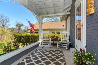 Sweet Covered Front Porch Welcomes You into Home