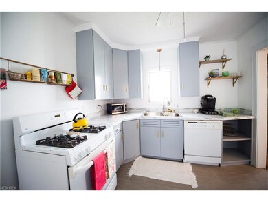 Totally Updated Kitchen provides ample space for storage, a gas range, dishwasher and newer refrigerator!