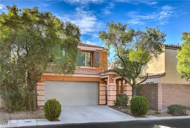 View of front of property featuring a tiled roof, stucco siding, an attached garage, and concrete driveway