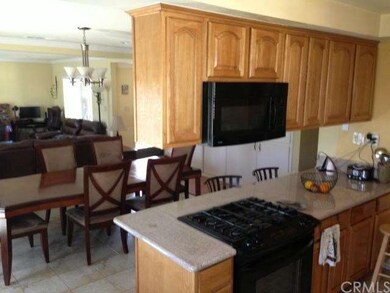 Entertainer's delight; kitchen has view of dining 