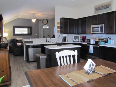 KITCHEN LOOKING TOWARD LIVING ROOM