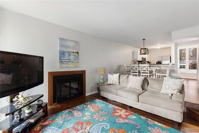Living room featuring dark hardwood / wood-style f