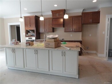 Kitchen with granite countertops and stainless ste