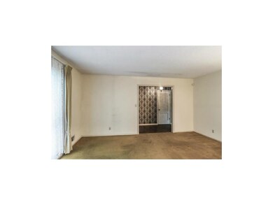 Living room with floor length window