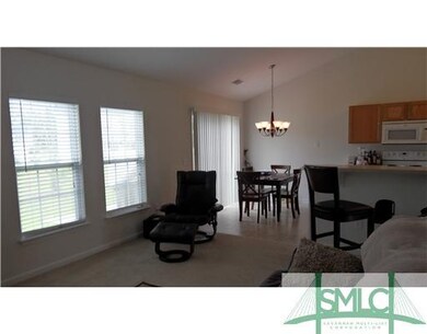 Living Room. LIVING ROOM FEATURES FAUX WOOD BLINDS
