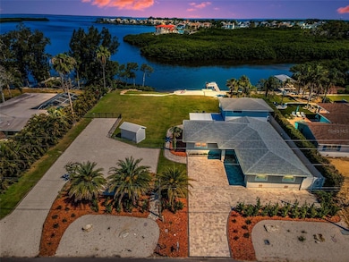 Just Look At This!! Over a 1/2 acre of Flat Level Land on 140' of Water Frontage wide Open Gulf Access