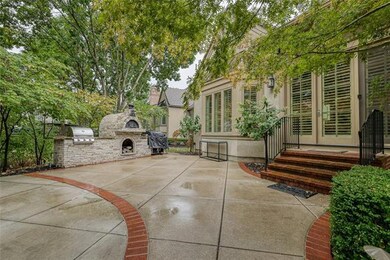 One of two back patios with built-in grills, pizza