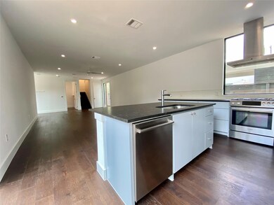 Kitchen featuring appliances with stainless steel