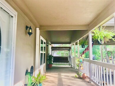 Enjoy your new covered front porch that comes with a swing!