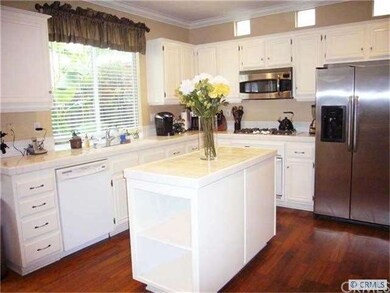 Open kitchen, bright and light with center island.