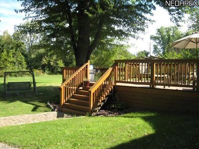 Wood deck on front and back of the home
