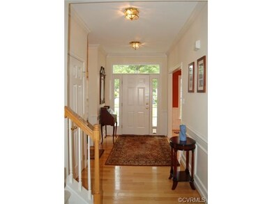 Elegant foyer includes with hardwood flooring, cro