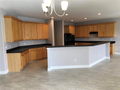 Large open kitchen with plenty of storage space.