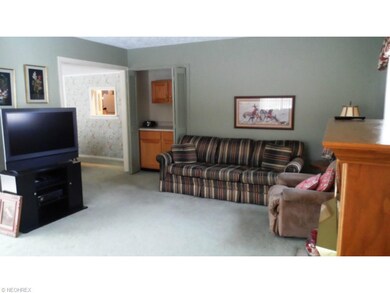 FAMILY ROOM WITH HIDDEN BAR AREA AND SLIDING DOORS
