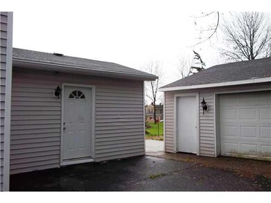 Exterior Front. Family room/half bath/1st floor la