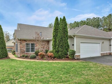 Oversized 2 car garage with storeage nook as well.